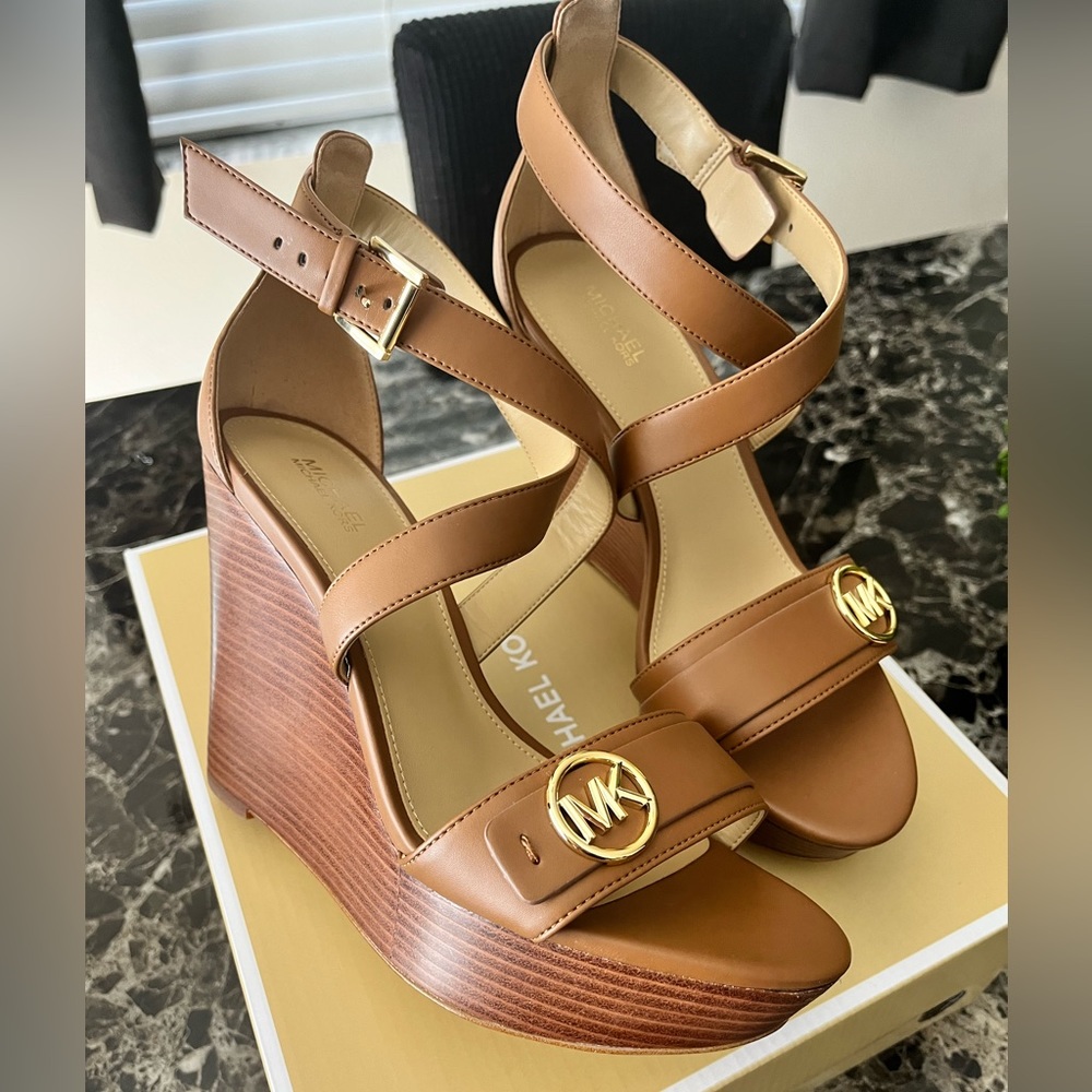 Authentic Brand New Michael Kors wedges.
